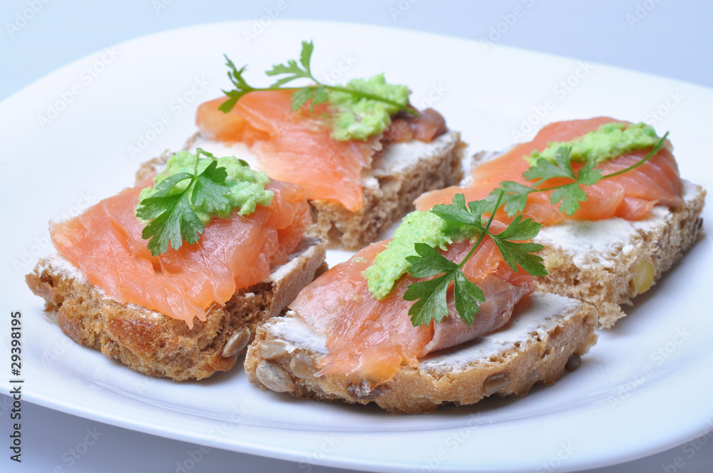 Sandwich with smoked salmon isolated
