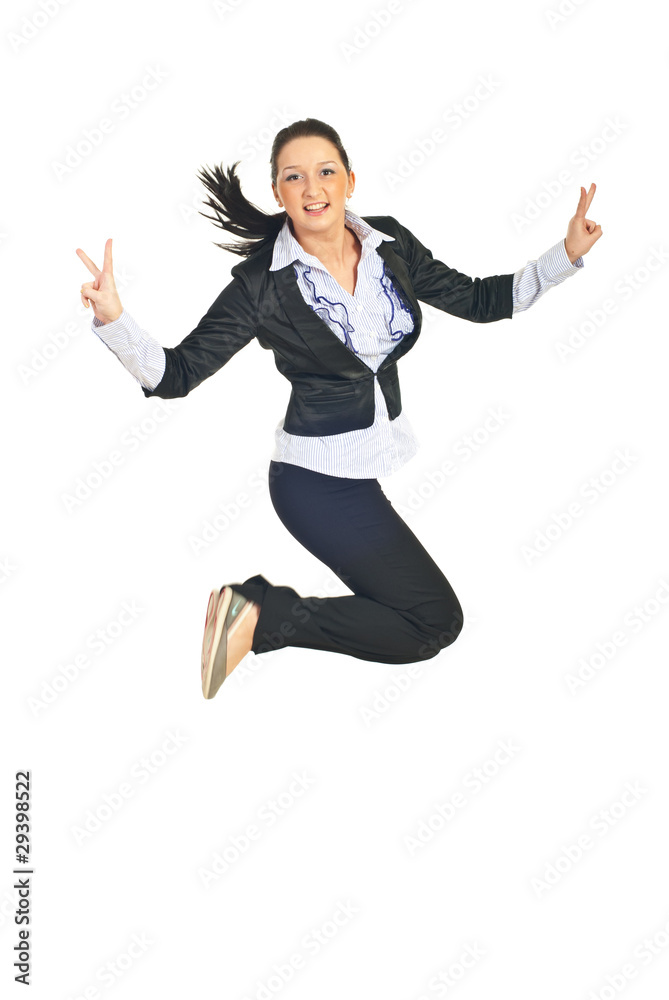 Victorious business woman jumping