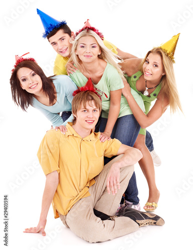 Group of young people in party hat.
