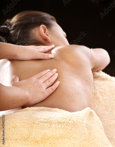 Young woman having massage.