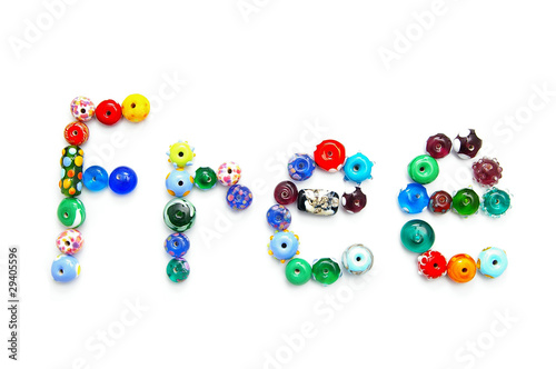 glass bead text spelling Free, on white
