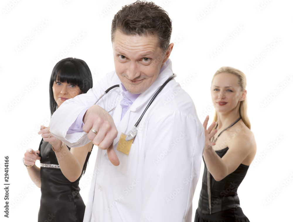 The man in a white dressing gown has lifted a thumb in downwards The man in a white dressing gown has lifted a thumb in downwards