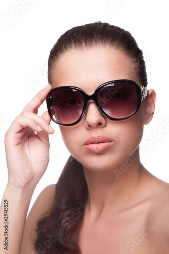 Portrait of beautiful young woman in sunglasses