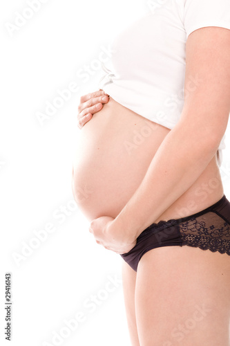 Man and pregnant woman with big belly