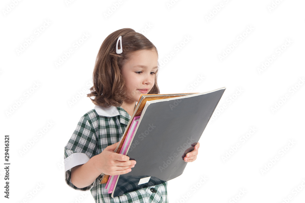 School girl looking at library books School girl looking at library books