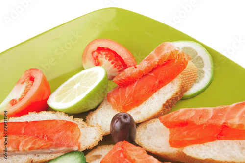 fresh salmon sandwiches and vegetables