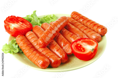 sausages served with tomato and salad