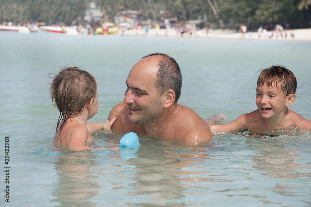 Fototapeta premium happy family playing in water