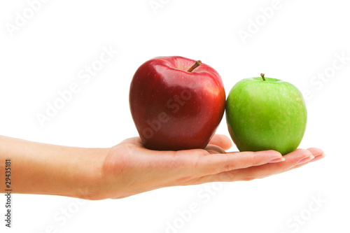 Two apples on a hand isolated over white background