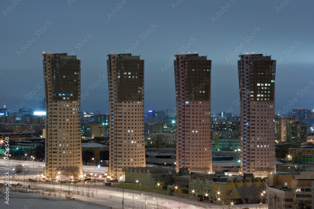 Naklejka premium Modern residential buildings in Moscow city at night
