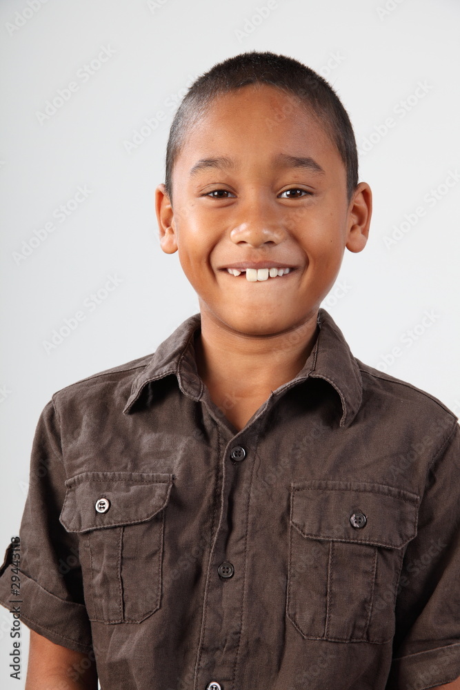 Portrait of schoolboy 9 with huge toothy smile Portrait of schoolboy 9 with huge toothy smile