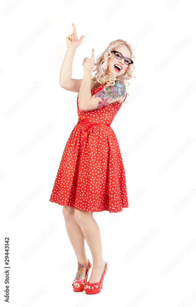 Pretty girl pointing up