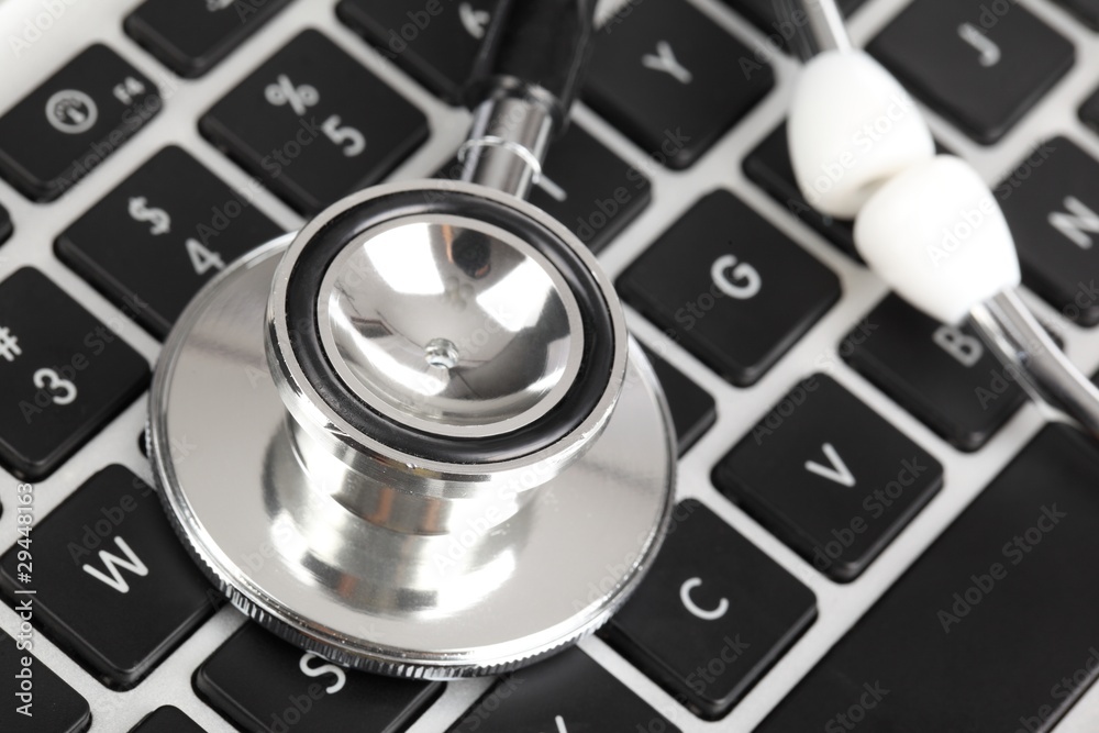 stethoscope on laptop