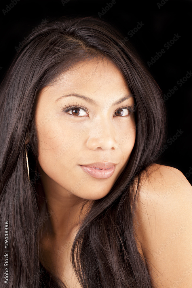 Portrait attractive Pacific Island woman bare shoulders Portrait attractive Pacific Island woman bare shoulders