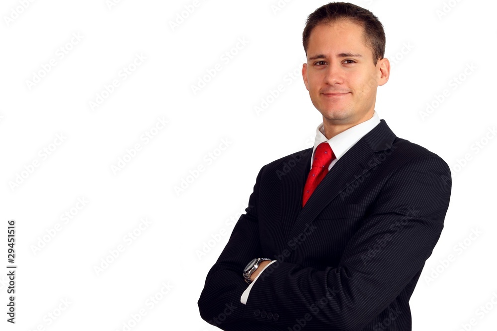 Handsome young business man smiling with his arms crossed Handsome young business man smiling with his arms crossed