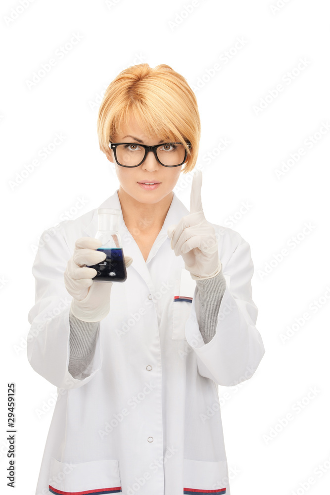 lab worker holding up test tube