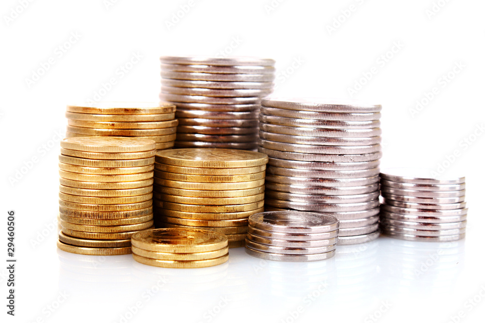 Many coins in column isolated on white Many coins in column isolated on white