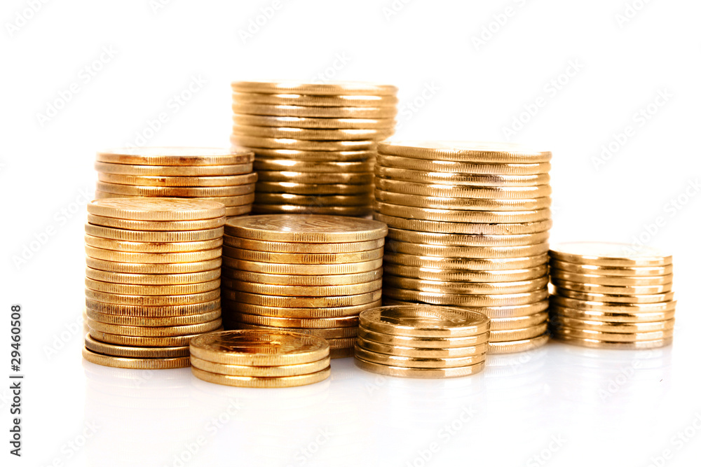 Many coins in column isolated on white Many coins in column isolated on white