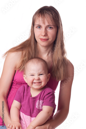 Mother with daughter sitting together