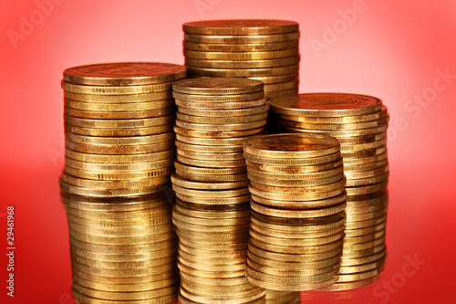 Coins on red background