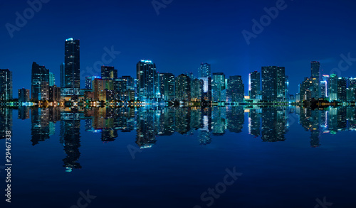 Miami skyline night panorama with beautiful reflections