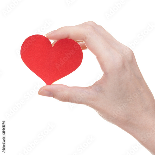 Heart shaped red greeting card in girl's hand on white backgroun