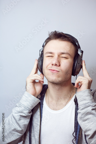 guy in headphones listens to music