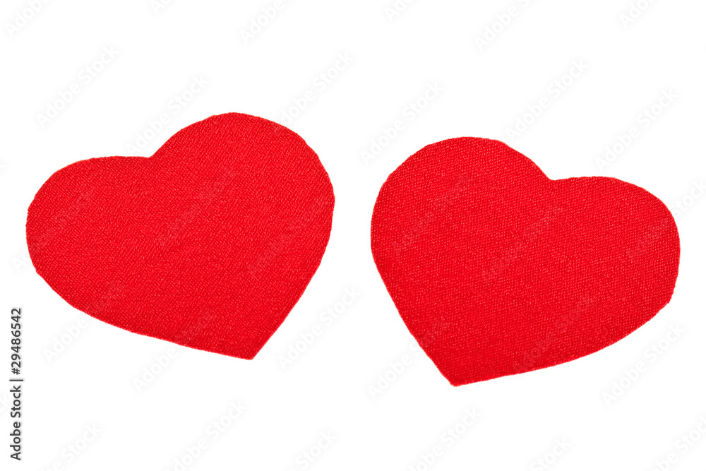 Two red textile hearts isolated Two red textile hearts isolated