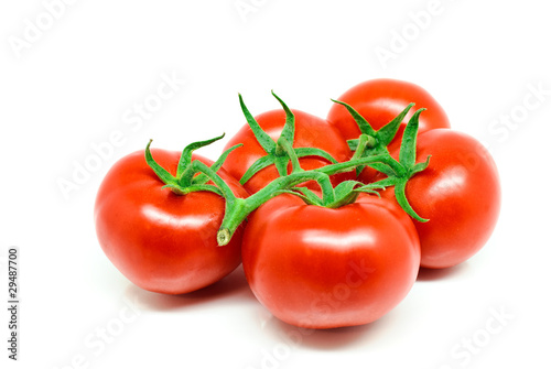 Red tomatoes isolated on white background