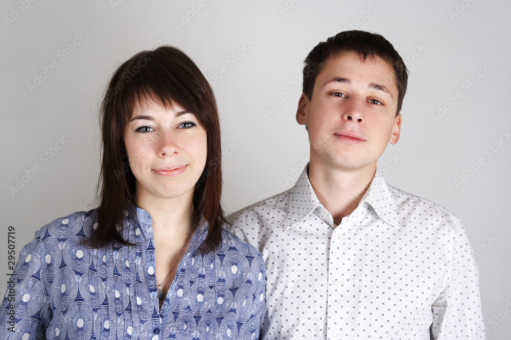 portrait of young beauty brunette woman and man looking at camer portrait of young beauty brunette woman and man looking at camer