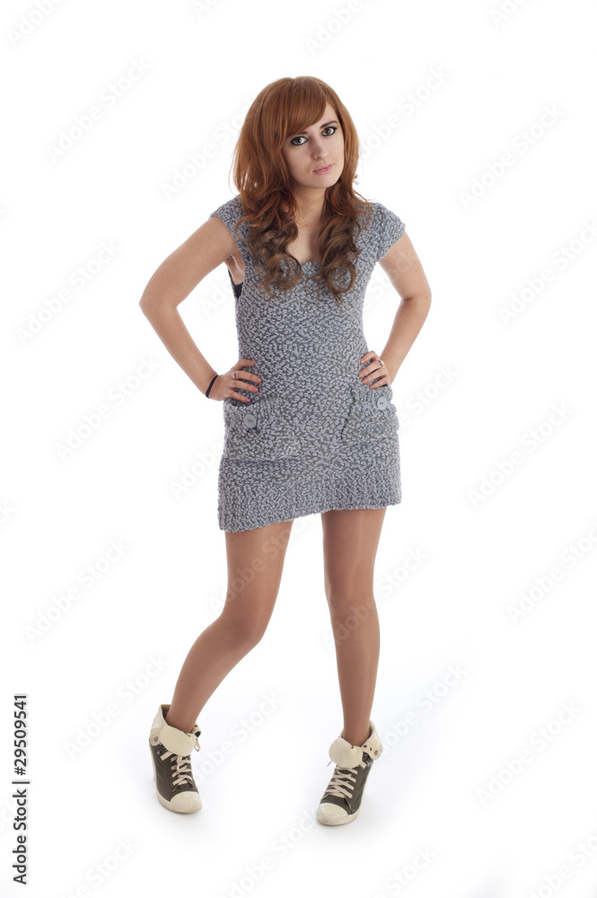 Pretty young red haired female against white Pretty young red haired female against white