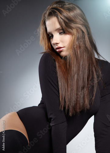 Glamour Portrait of sexy woman on grey background