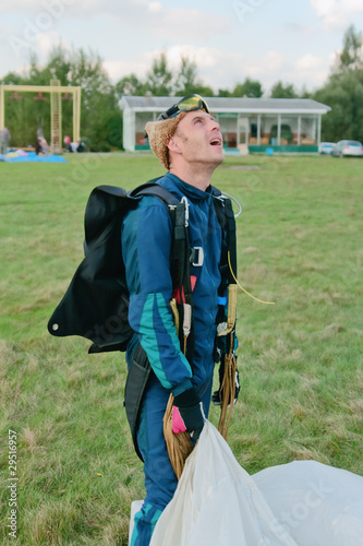The parachutist after a landing looks in the sky