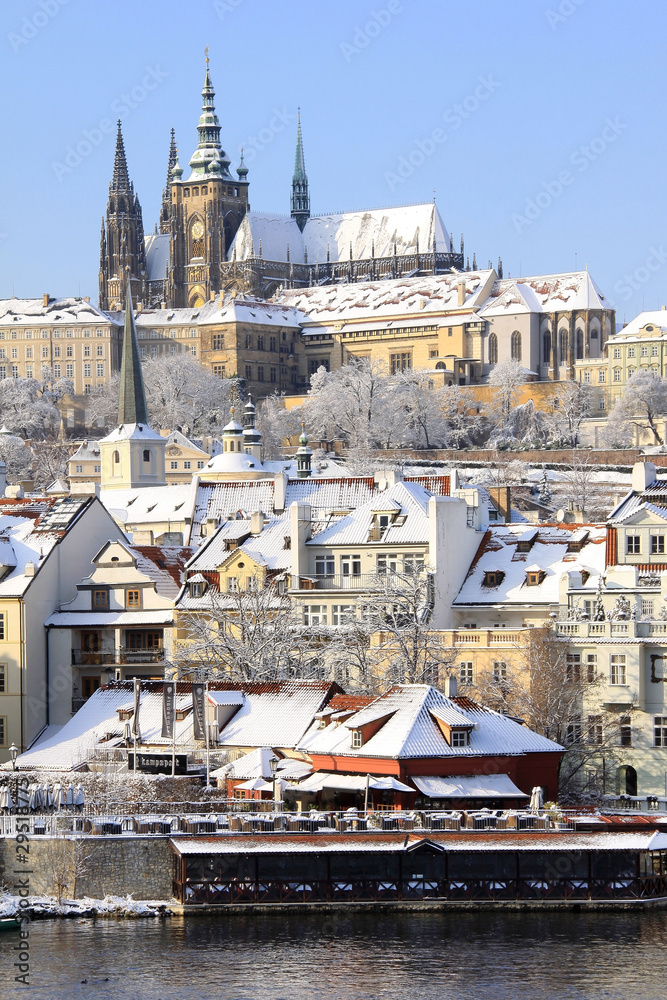 Romantic Snowy Prague gothic Castle above the River Vltava