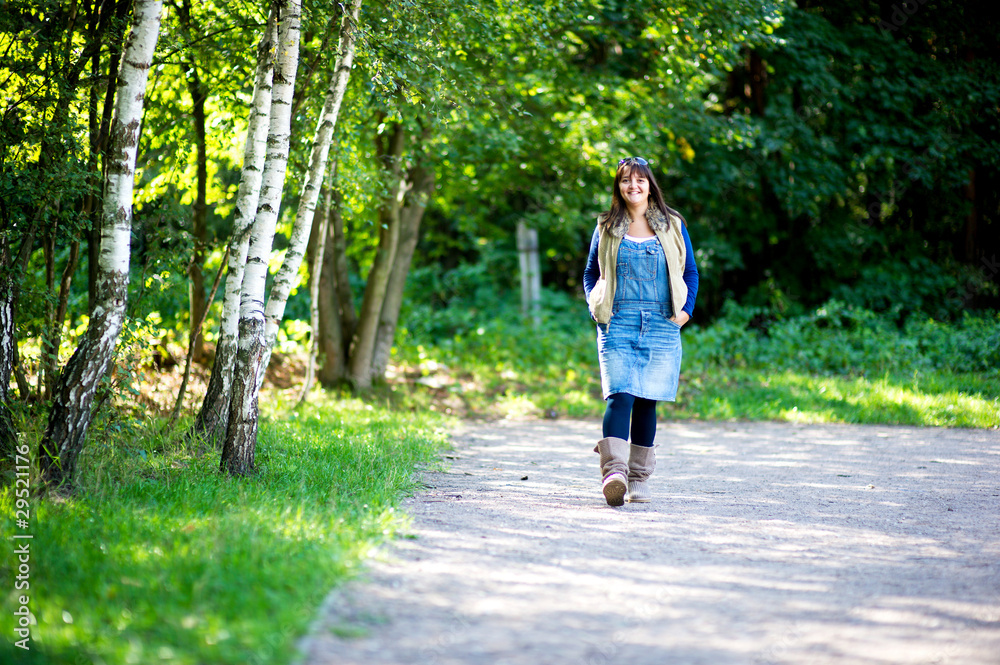 Nice young brunette woman has fun in the park Nice young brunette woman has fun in the park