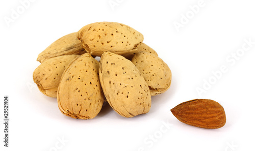 Group of almonds with one shelled