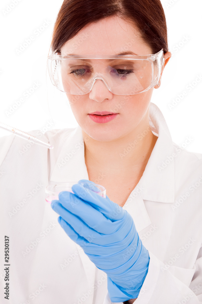 closeup of a young female researcher carrying out experiments, i closeup of a young female researcher carrying out experiments, i