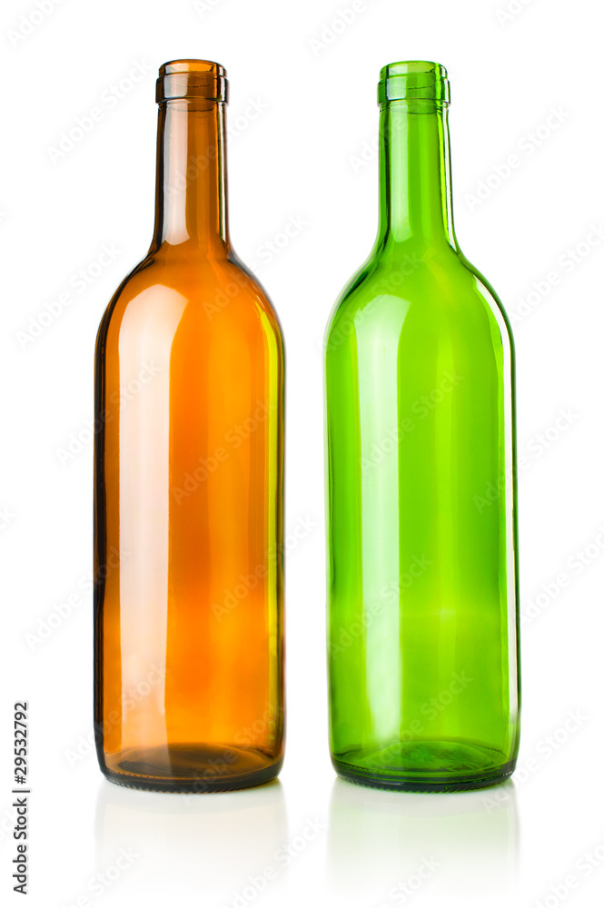 Two empty transparent green and brown wine bottles Two empty transparent green and brown wine bottles