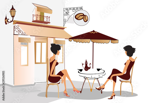 Chatting girls in the cafe