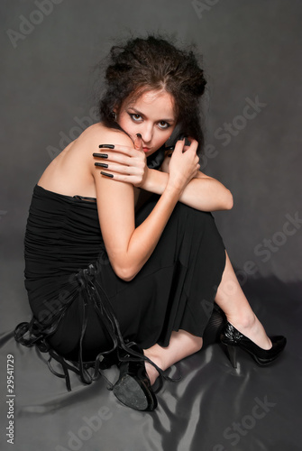 witch with black nails