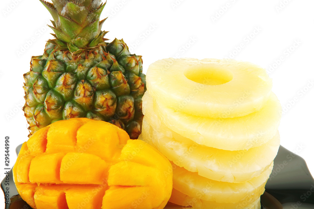 tropical fruits served on black tropical fruits served on black