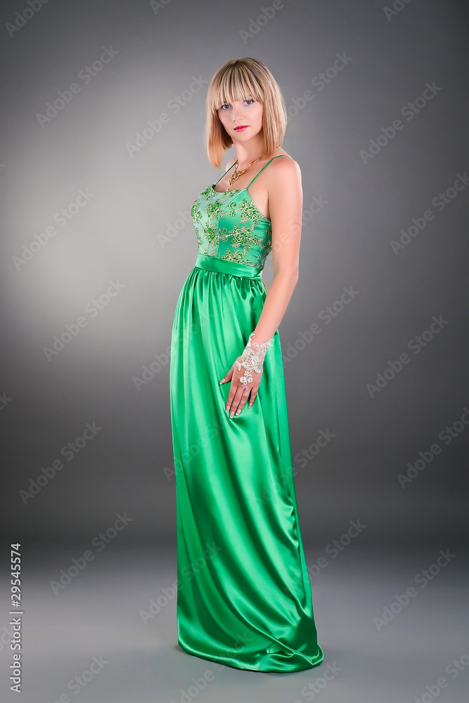 attractive young woman posing in evening outfit attractive young woman posing in evening outfit