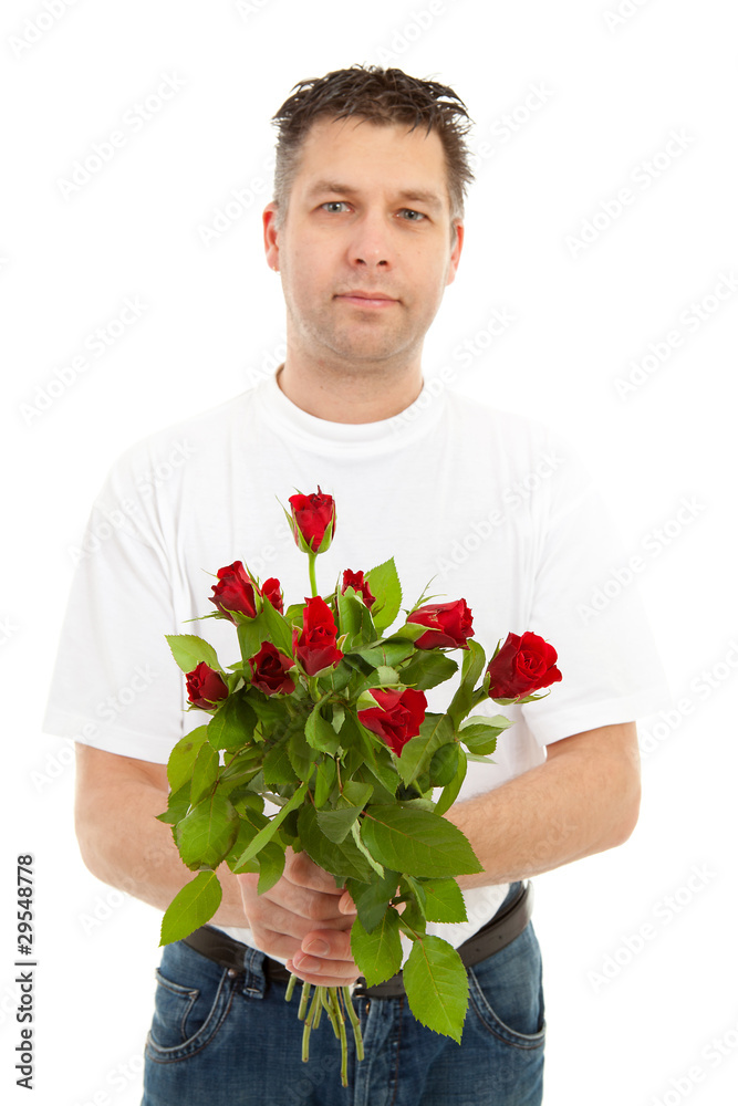Handsome man is giving bouquet of roses over white background Handsome man is giving bouquet of roses over white background