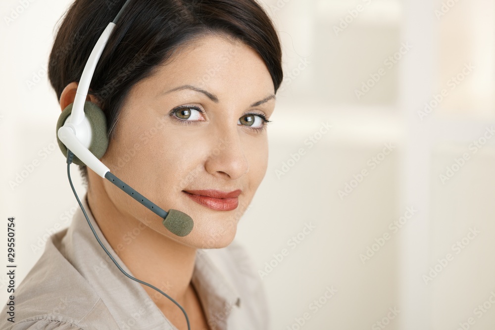 Closeup portrait of woman with headset Closeup portrait of woman with headset