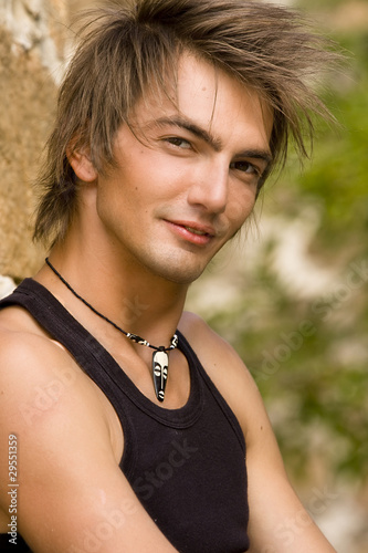 handsome young loose man close-up portrait