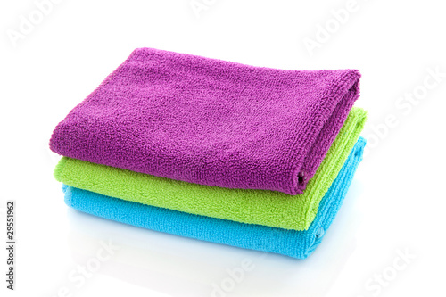 pile of colorful towels over white background
