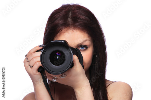 Woman with DSLR isolated