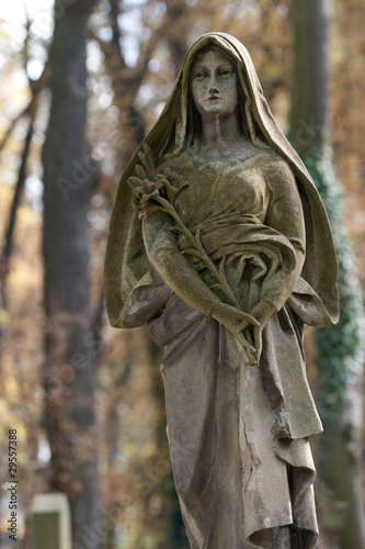 Monument Lady of Guadalupe on a cemetery