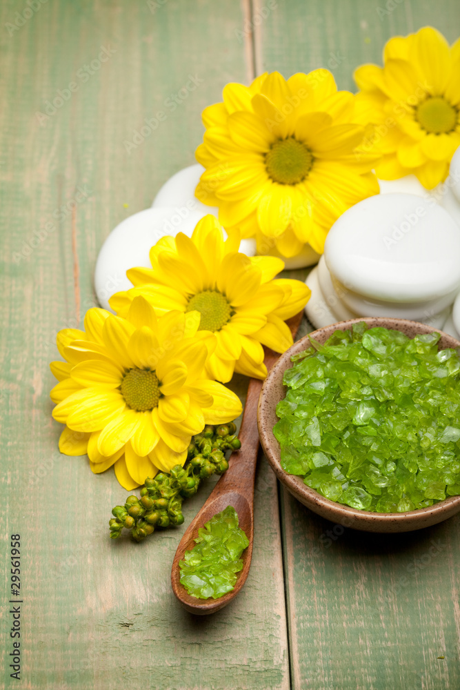 Yellow flowers and green spa minerals