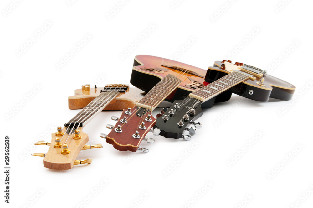Musical guitar isolated on the white background Musical guitar isolated on the white background